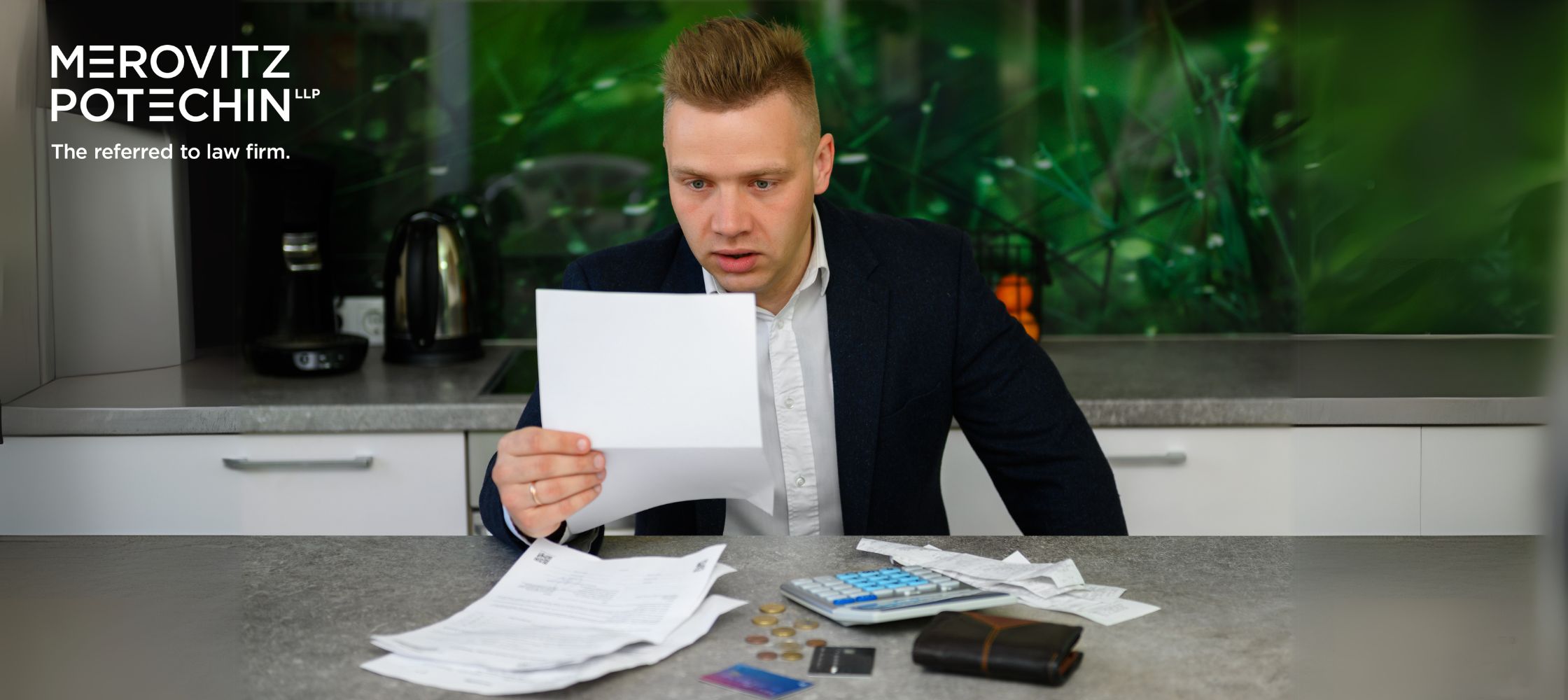 A concerned man in a suit sits at a kitchen counter, reviewing a document with a shocked expression, surrounded by scattered bills, a calculator, coins, and a wallet. The Merovitz Potechin LLP logo and the tagline "The referred to law firm" appear in the image, emphasizing commercial lease termination in Ontario. The setting suggests a legal or financial issue related to tenancy disputes or lease agreements. The background features a modern kitchen with a kettle and green-themed décor.